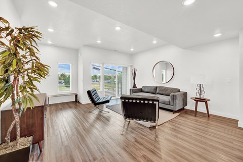a living room with a couch and a chair