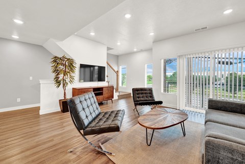 a living room with two couches and a coffee table