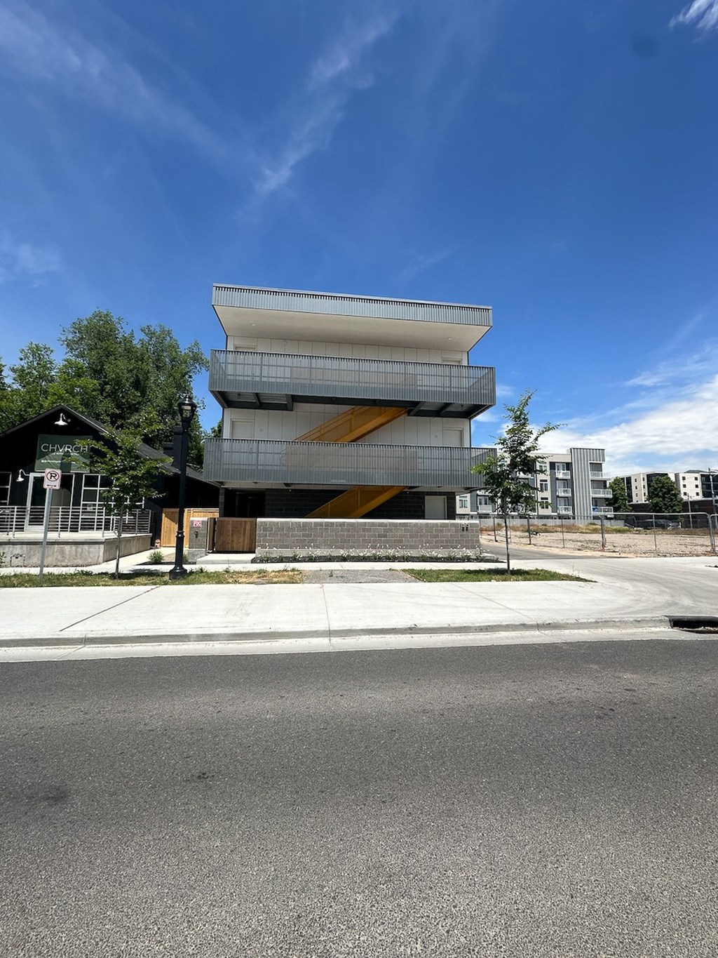 an office building on the corner of a street