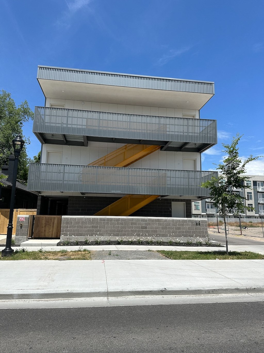 the front of a building with a blue sky background