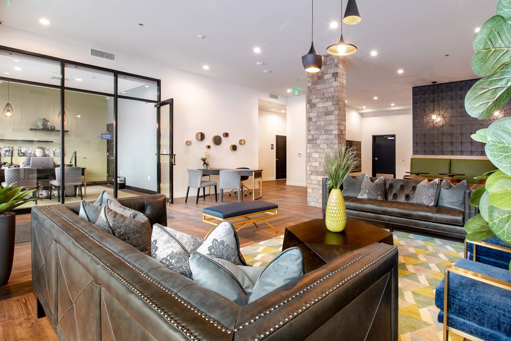 a living room with couches and a table