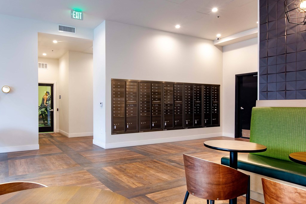 the lobby of a hotel with a large calendar on the wall
