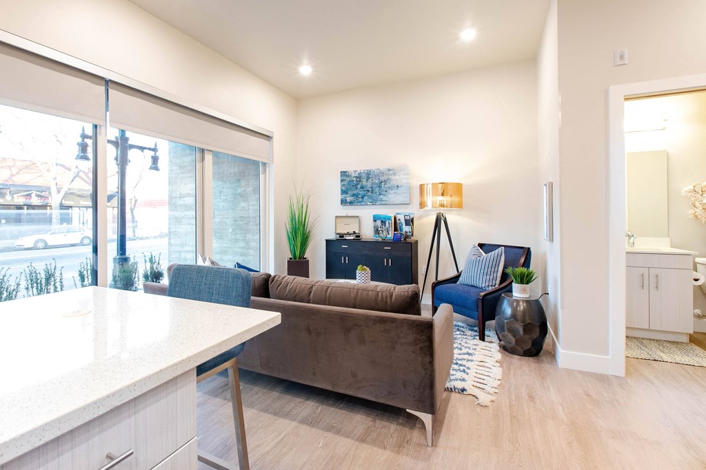 a living room with a couch and a table