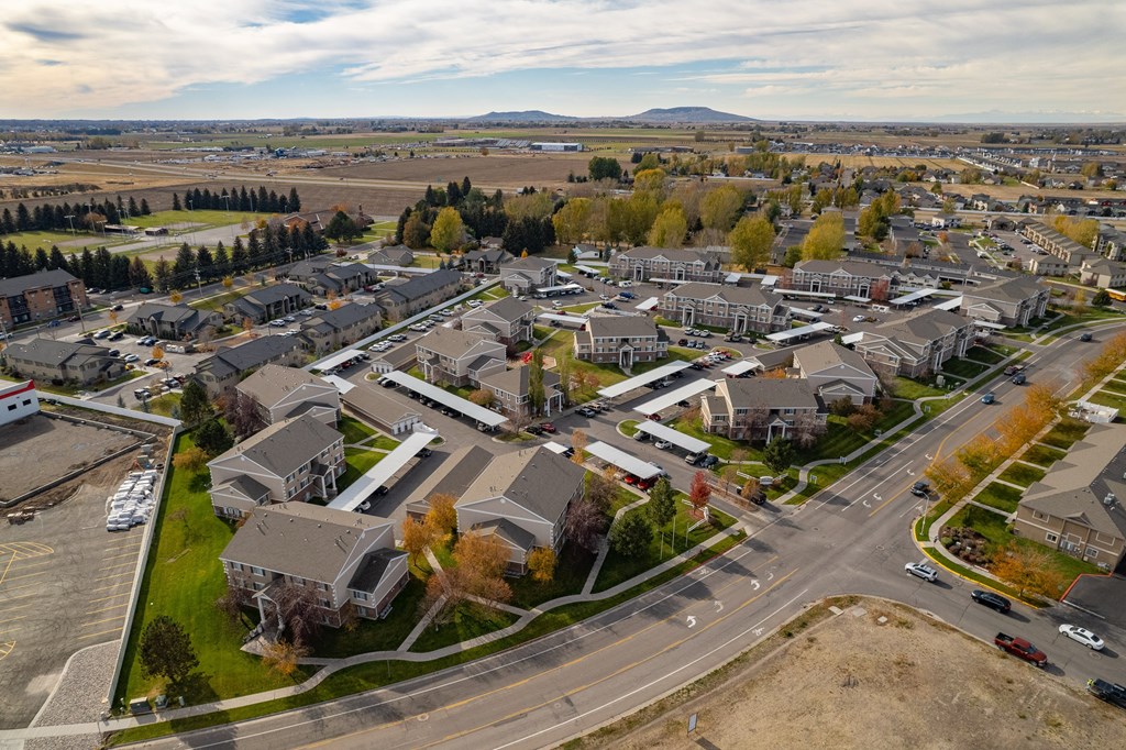 an aerial view of a neighborhood of houses in a city