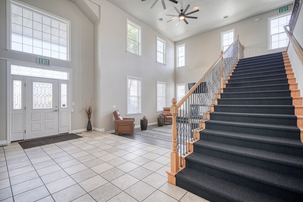 a view of the entryway and stairs to the second floor