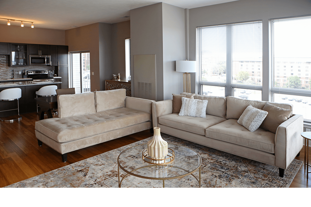 a living room with a couch and a table