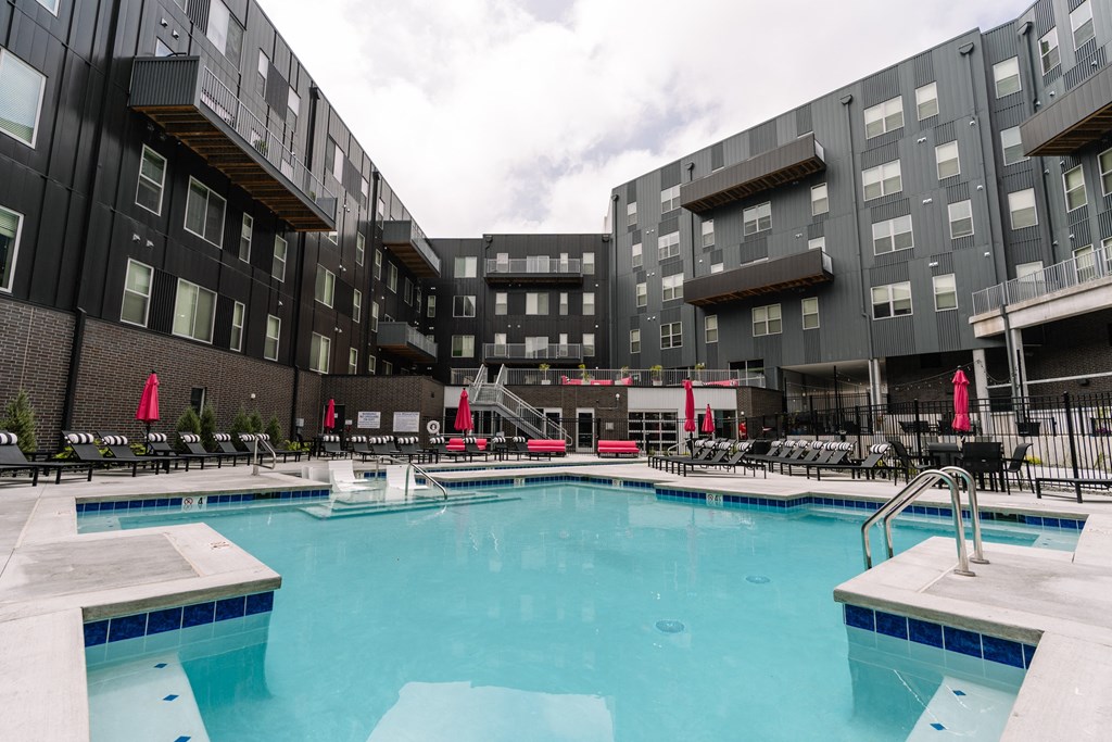 a large pool in front of a building