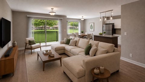 A living room with a large couch and a flat screen TV.