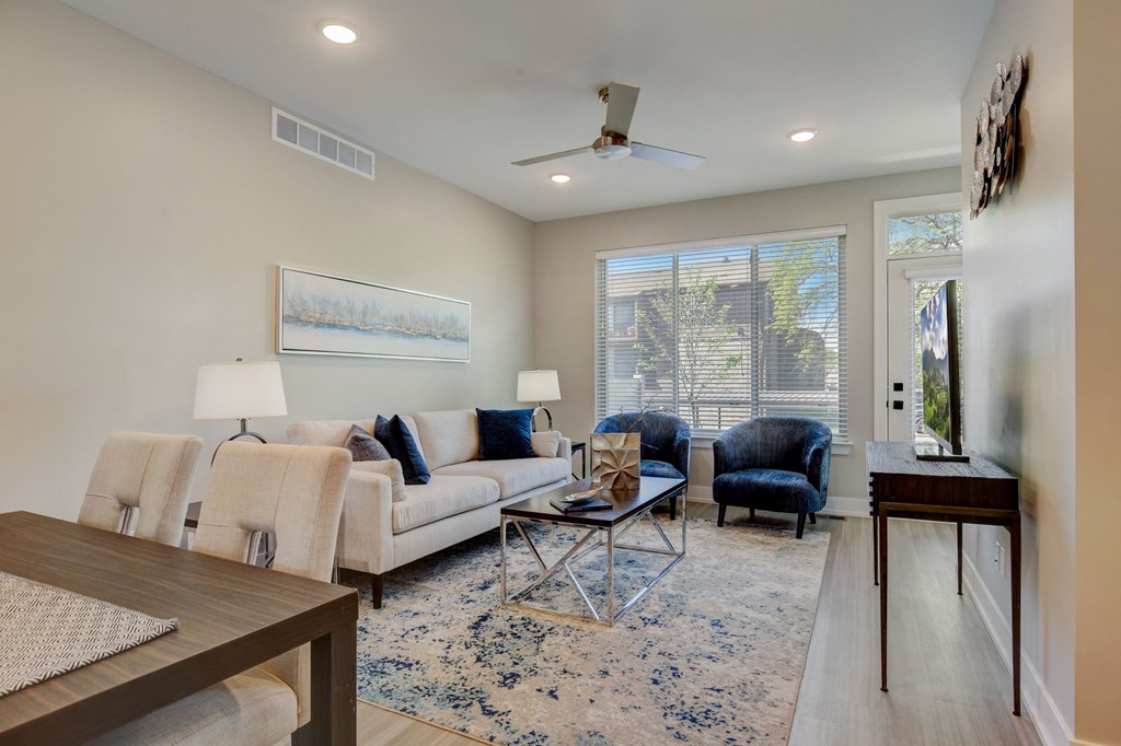 a living room with a couch and a table