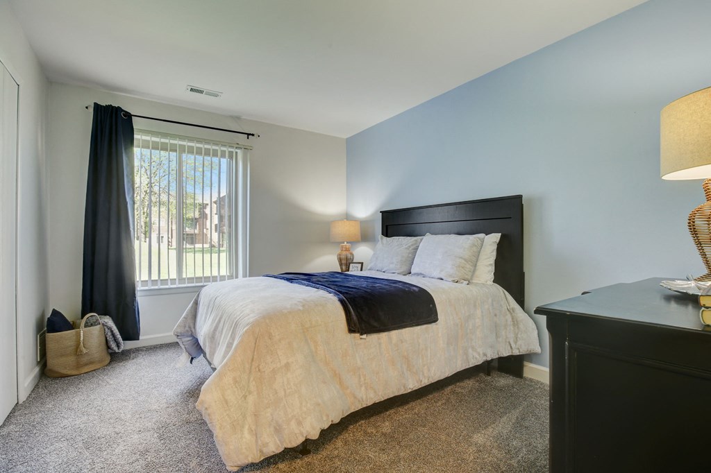 the preserve at ballantyne commons bedroom with bed and window