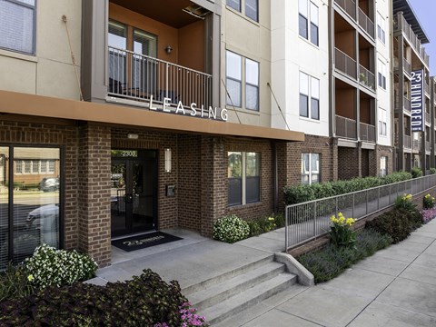 The image shows a building with the name "LEASN" on it.
