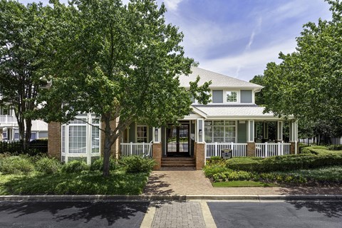 Clubhouse and leasing office exterior - Belle Harbour Apartments