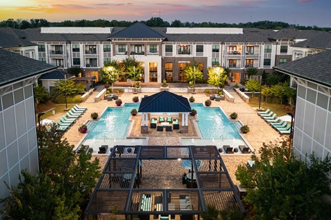 The Juncture Apartments aerial view of one resort-style pool and surrounding sundeck