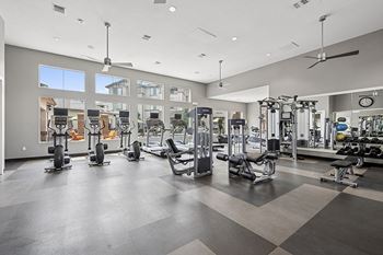 24-hour fitness center - First and Main Apartments