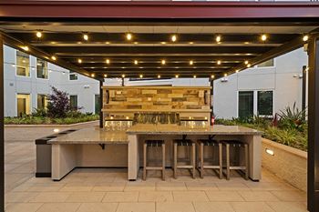 La Via courtyard with grills and seating