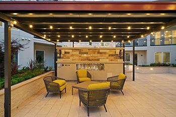 La Via courtyard fireplace with seating