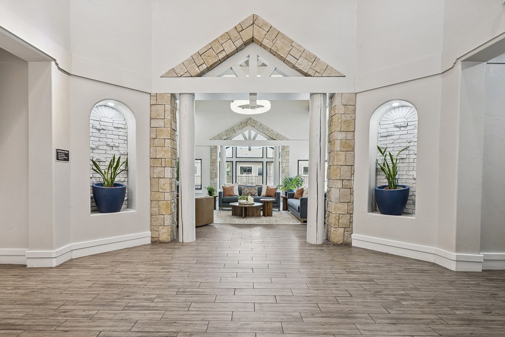 Clubhouse great room with lounge seating - Grand Centennial Apartments