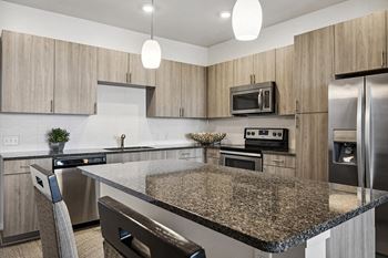 Granite countertops and kitchen islands  Enclave at Cherry Creek