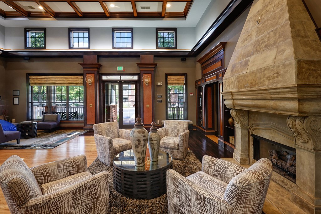 Belle Harbour Apartments clubhouse interior with fireplace