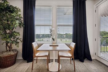 Hardwood-style floors in living areas - Enclave at Cherry Creek