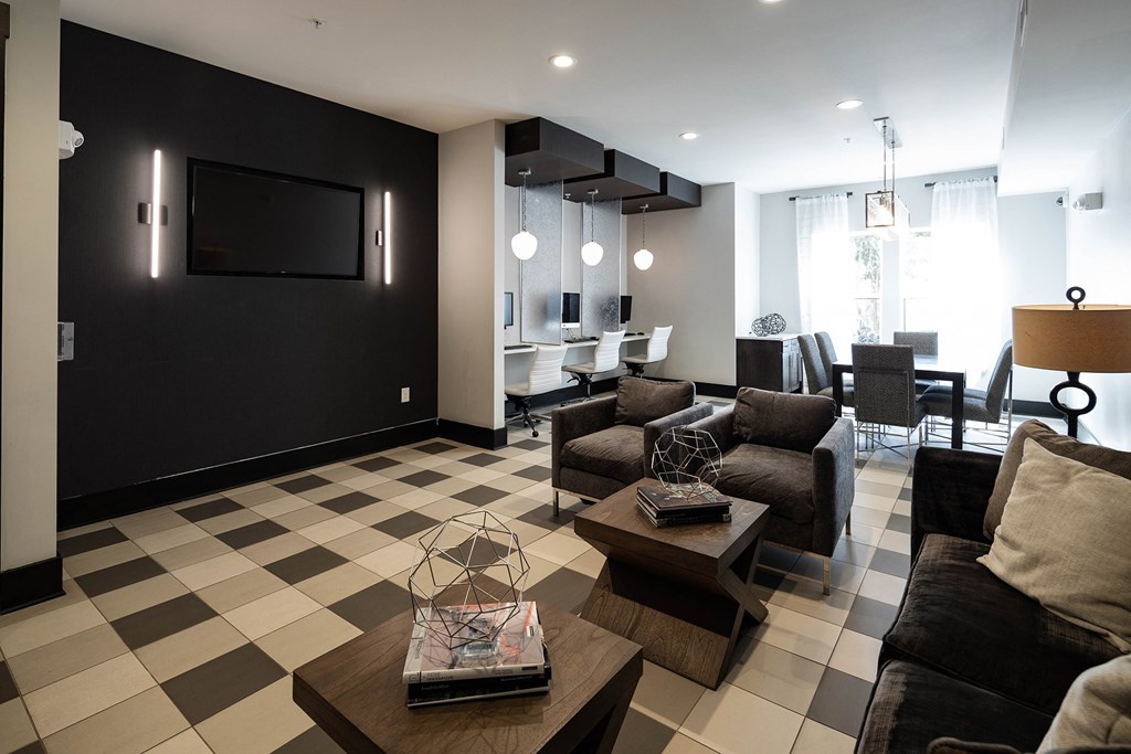 The Juncture Apartments business center with iMacs and PCs