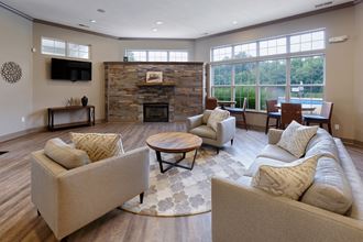 Lantern Woods Apartments - Resident clubhouse with fireplace Lantern Woods Apartments - Resident clubhouse with fireplace