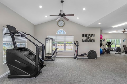 Fully-equipped fitness center - The Colony at Deerwood Apartments