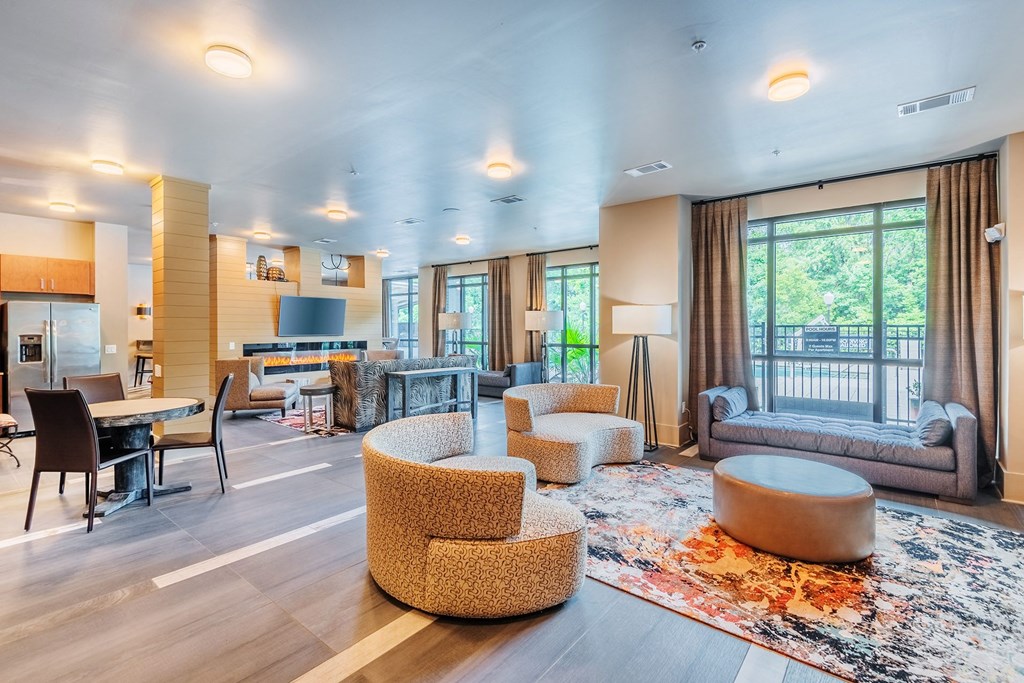 Centre Pointe Apartments clubhouse with a clubhouse kitchen and lounge area