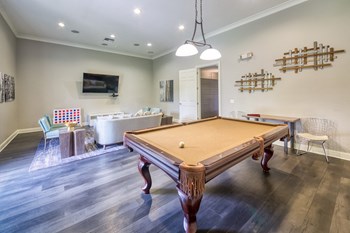 Courtney Station Apartments - Resident clubhouse with billiards table Courtney Station Apartments - Resident clubhouse with billiards table - Photo Gallery 4