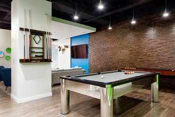 The Republic Apartments - Game room with billiards table The Republic Apartments - Game room with billiards table - Photo Gallery 4
