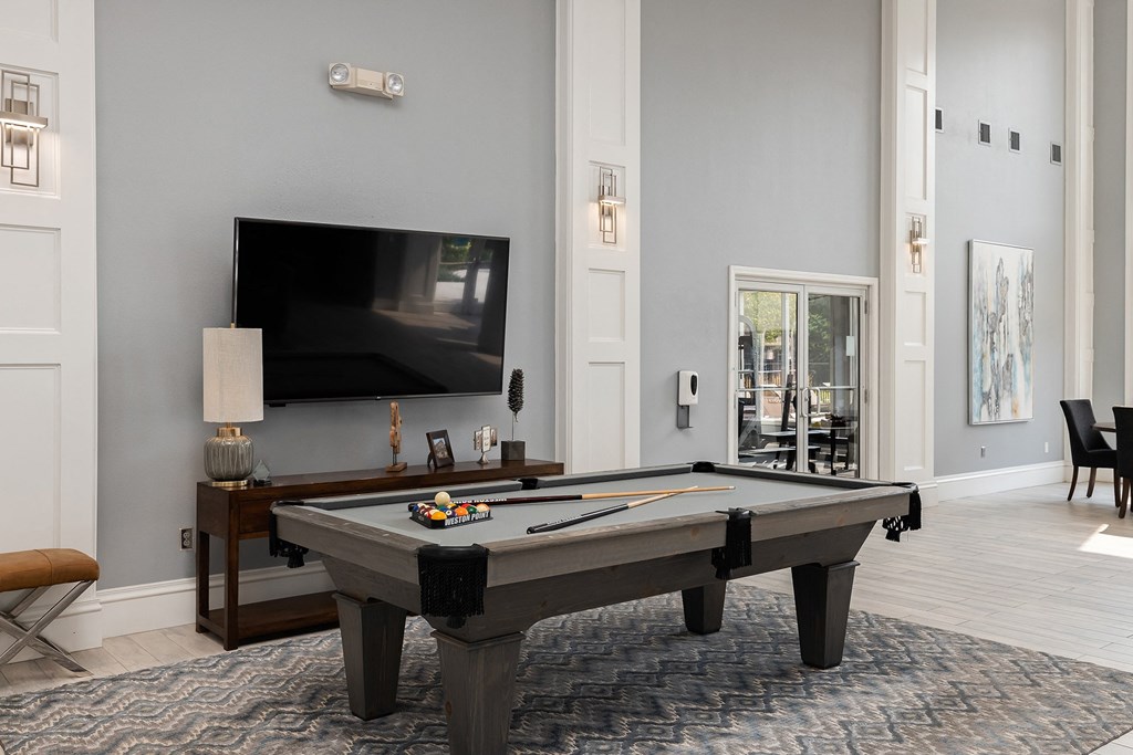 Weston Point Apartments - Clubhouse with billiards table