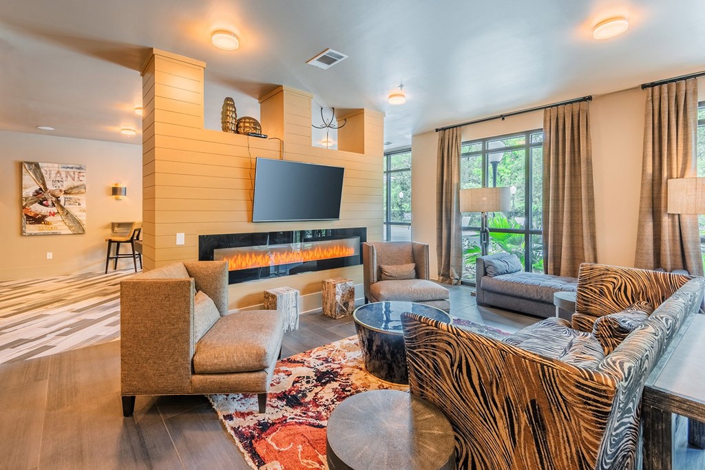 Centre Pointe Apartments clubhouse with television and conversation area