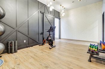 Movement studio featuring Peloton equipment - Emmersyn at Lone Tree