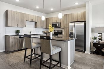 Whirlpool stainless steel appliances - Enclave at Cherry Creek