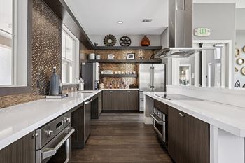 Fully-appointed clubhouse kitchen - First and Main Apartments
