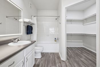 Luxurious baths with oversized Roman tubs - Grand Centennial Apartments