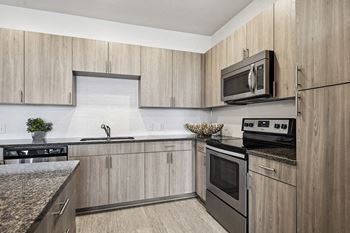 Cabinet-mounted microwave - Enclave at Cherry Creek