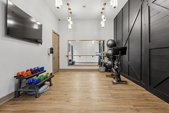 Movement studio featuring Peloton equipment - Emmersyn at Lone Tree