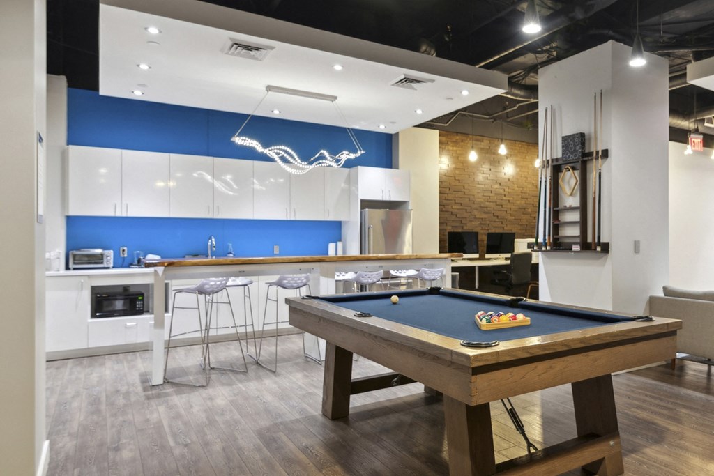 The Republic Apartments - Clubhouse amenities including kitchen area and game room
