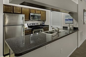Stainless steel appliances - The Gardens at Polaris