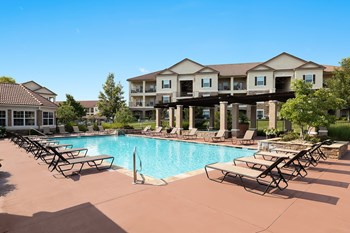 Cordillera Ranch Apartments swimming pool with surrounding sundeck - Photo Gallery 8