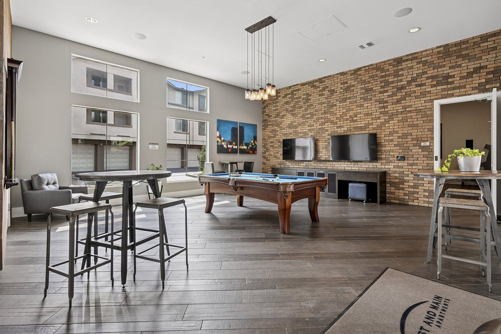 Game room with billiards table - First and Main Apartments