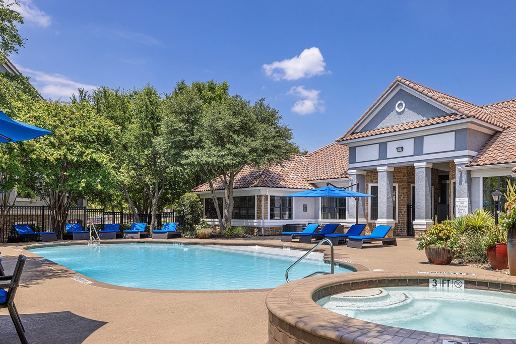 Resort-style swimming pool with heated spa - DeLayne at Twin Creeks