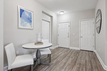 Wood-style flooring in kitchen, entry and bathrooms - First and Main Apartments