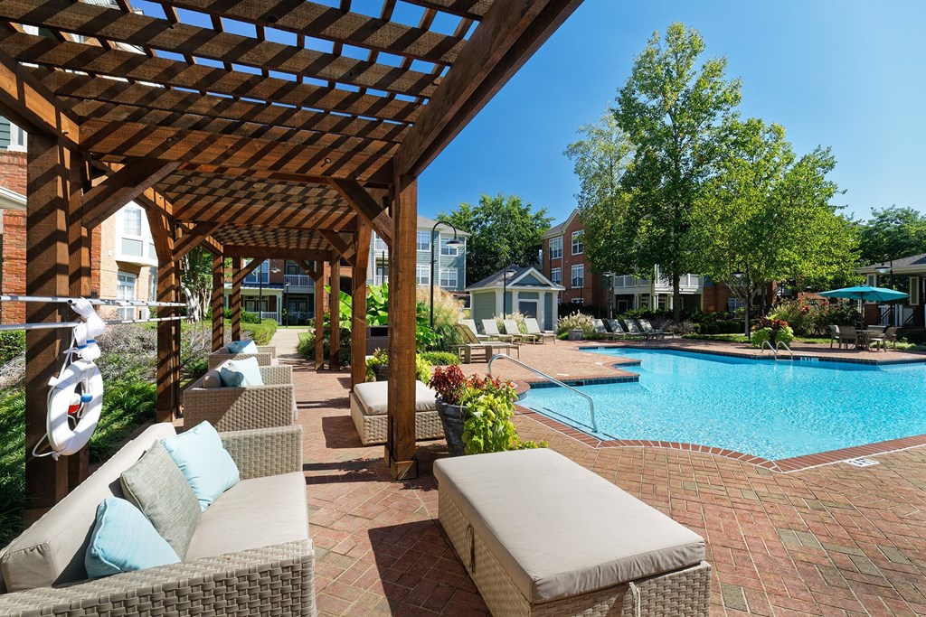 Belle Harbour Apartments poolside lounge seating