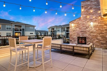 The Haven at Shoal Creek - Outdoor fireplace - Photo Gallery 11