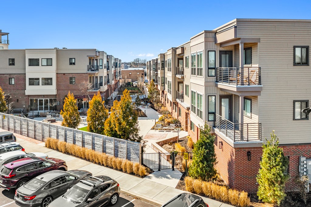 Lansdale Station Apartments exterior photo of landscaping and balconies