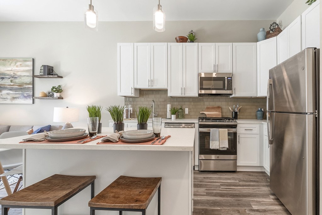 The Airdrie at Paoli Station breakfast bar and white cabinets