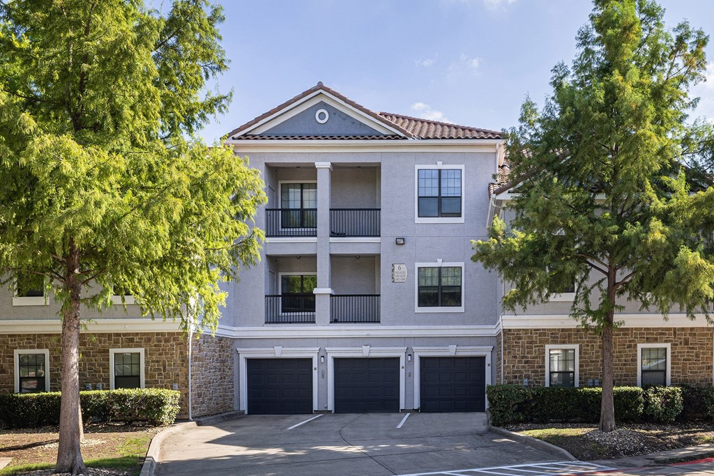 Select apartments with attached garages - DeLayne at Twin Creeks