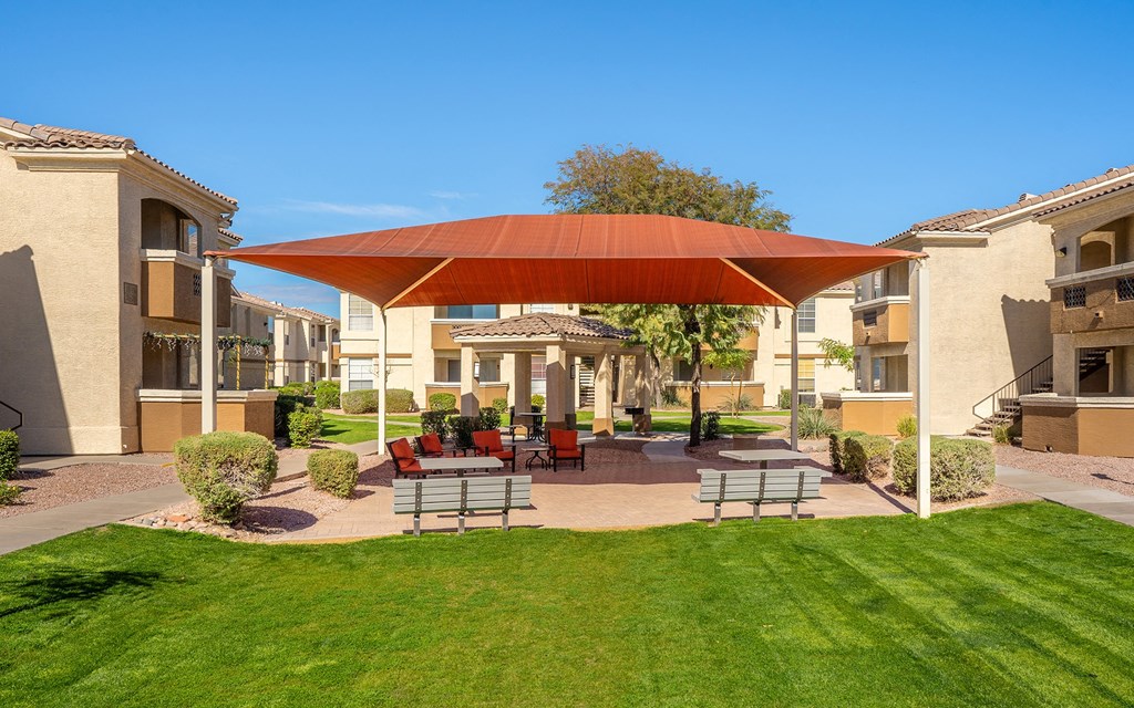 BBQ lounge area - Arrowhead Landing Apartments